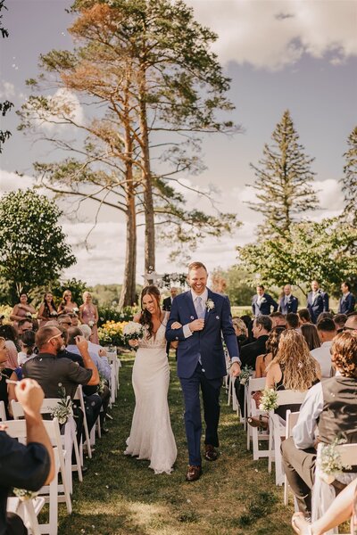 Bride and groom during ceremony at Dellwood Country Club in Minnesota