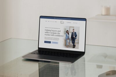 Mockup of real estate agent website on laptop