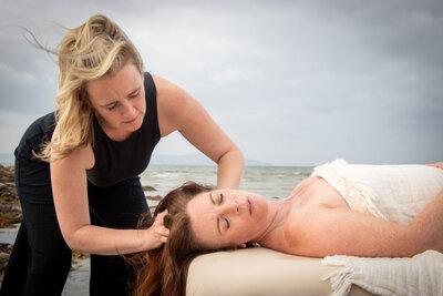 Galway massage therapist uses massage techniques to calm client and give a scalp massage.