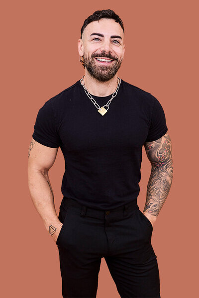 Cristiano, Top male hairstylist in Sydney posing confidently, highlighting professional hair styling skills.