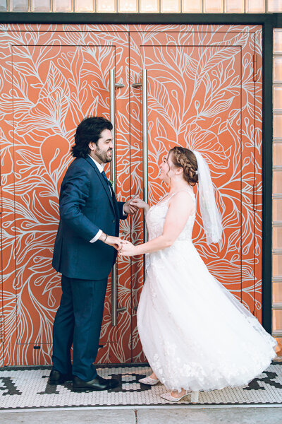 A couple dances on their wedding day outside of The Arbory in Chicago