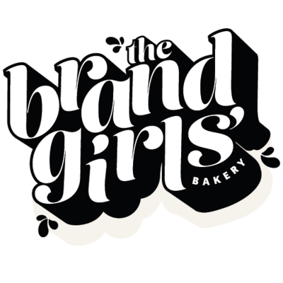 the brand girls' bakery written in white with a deep black shadow