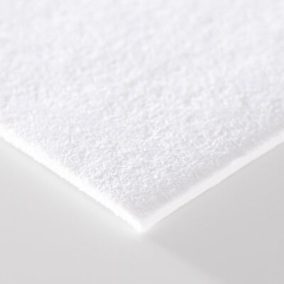 a close up of a piece of double ply cotton paper