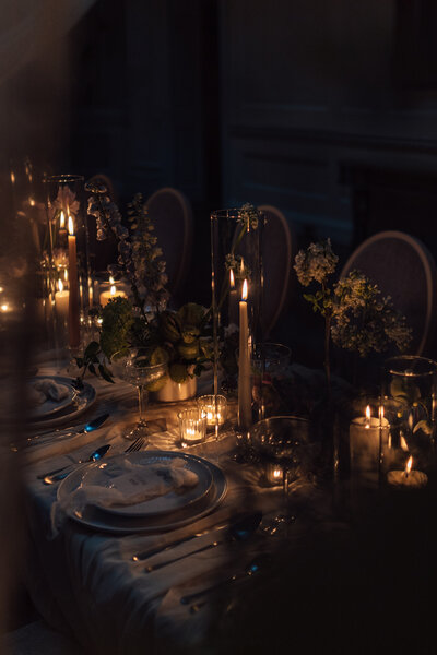 Wedding photographer captures couple taking a stroll hand in hand at their french chateau wedding.