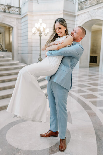 bride and groom at san francisco city hall with bay area photographer