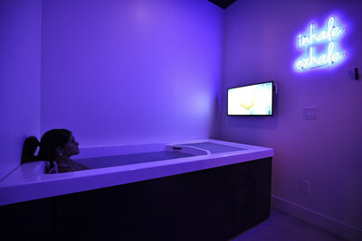 Woman in a cold plunge tub