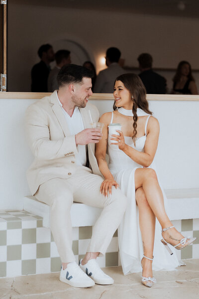 Bride and groom walking hand in hand at sunset during their Adelaide wedding, captured by JakeyVass Media