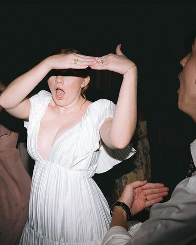 bride dancing at reception by austin wedding photographer