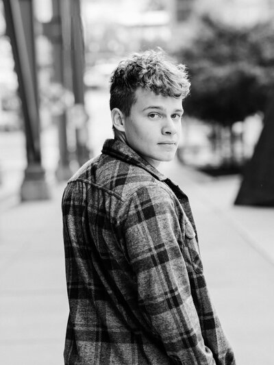 senior boy posed for senior portraits in cleveland