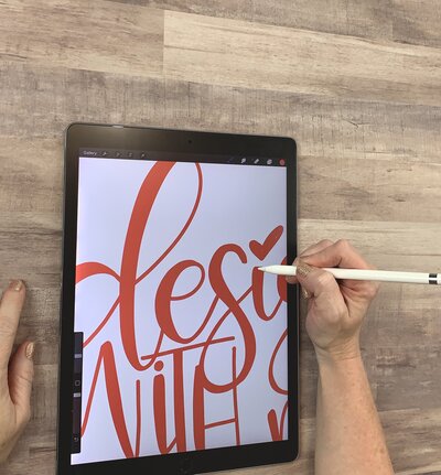 Red hand lettering on iPad Procreate