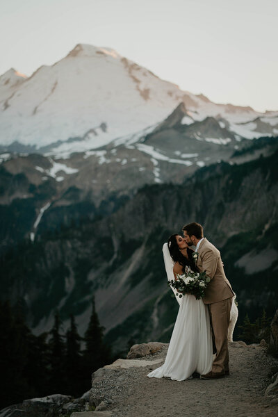 Couple eloping on a mountain in the north cascades