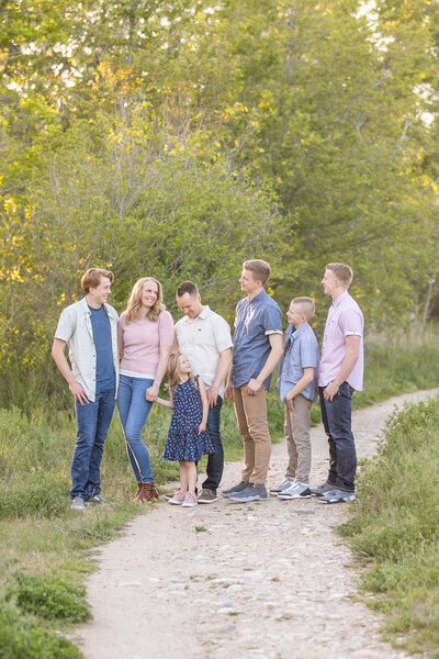 Family of 7 on a path newar the Boise Greenbelt.