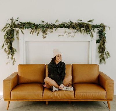 woman sitting on a couch