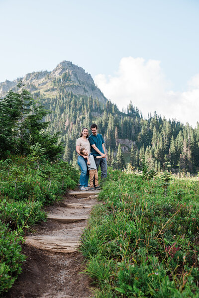 Family hiking at Tipsoo Lake wearing cream and navy color scheme for summer family photos