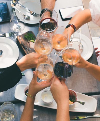 group-of-people-holding-wine-glasses-1097425