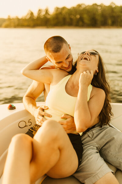 couple laughing on boat together