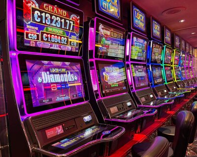 Slot machines representing actor Cassi Angier's role in a commercial for The Mill Casino.