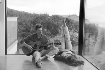 engagement photos while he plays the guitar