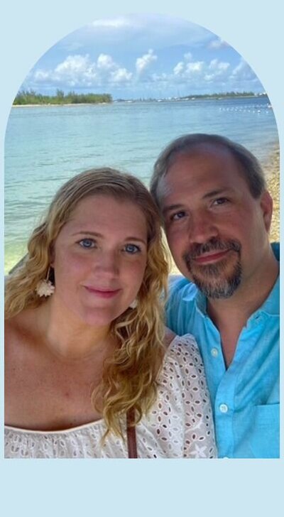 Nicole Naugle owner of Lakeshore Interior Design on beach in south florida with her husband