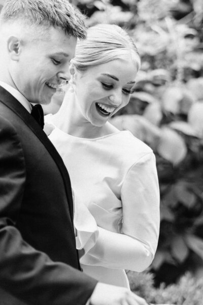 closeup black and white photo of bride and groom