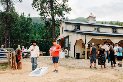 Outdoor wedding reception near barn at The Ranch at Wolf Creek in St. Regis, MT