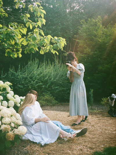 120 film photo of a mother and daughter dancing together in a field by huntsville photographer