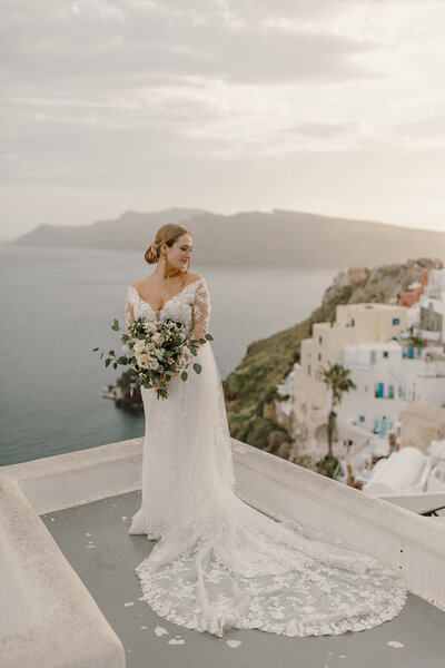 bride holding flowers in greece