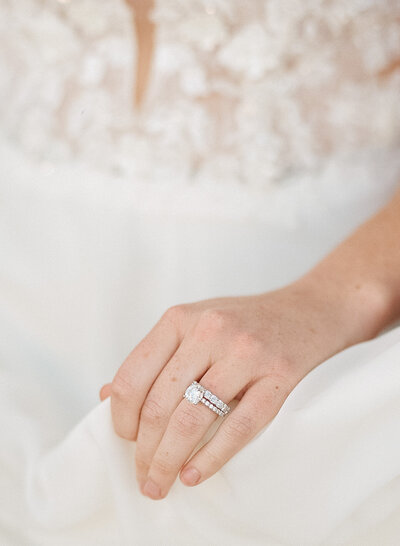 Close up of wedding rings on brides finger on her wedding day