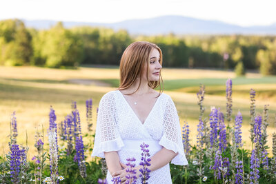 Girl in white dress in Lupin field | Senior Portraits Session