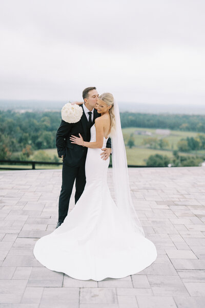 Bride and groom walk up memorial steps at their DC wedding