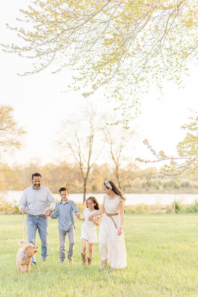 family of 5 laughing during their family picture in Ashburn, VA, taken by a Loudoun County, Virginia family photographer
