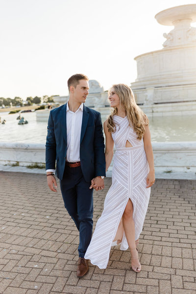 Bride and groom walk up memorial steps at their DC wedding