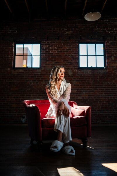 girl walking down hallway for senior pictures at the historic Bleak House in Knoxville, TN