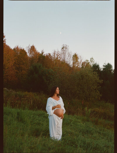 black and white image of daughter on her fathers back