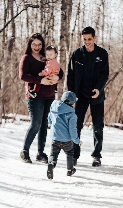 Edmonton mom and dad pose with their son and daughter