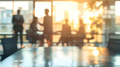 silhouette  of business professionals in an office
