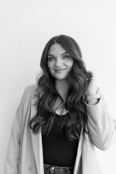 Professional headshot of Raechel from Raechel Marie Photo taken inside Honeytree Studio in Kalamazoo, Michigan.