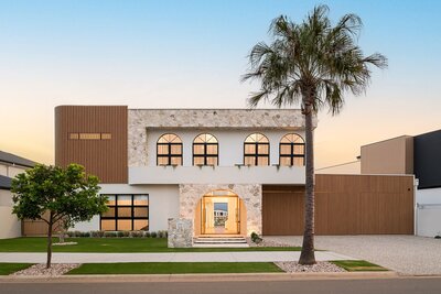 Marisol – A modern Mediterranean home by NXTgen Construction featuring warm tones, arched windows, and bespoke finishes.