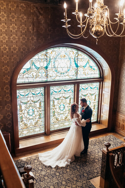 Bride and Groom embracing at their intimate ceremony at The Whitney Detroit.