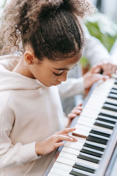 A piano student uses the Franklin Method to play with more ease.