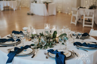 Decorated table settings for wedding reception
