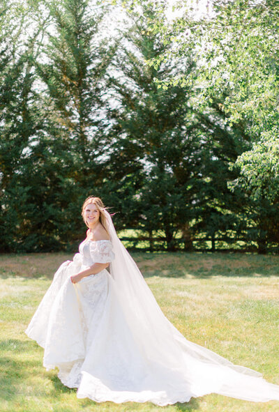 Bride in the mid day glowing light at The Inn at Vint Hill in Warrenton, Virginia. Taken by Charlottesville Wedding Photographer Bethany Aubre Photography.