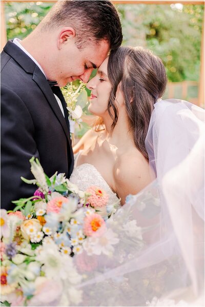 close up of bride and groom wedding portrait by Joni Loraine Photography