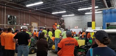 Embassy Landscape crew having a meeting before going out to work