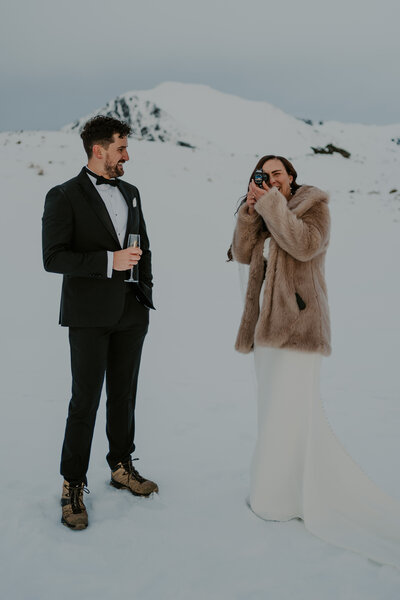 Amy and Nick on mountain with super-8 camera