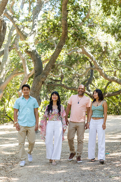 Family smiling in portrait at Oak Canyon Nature Center