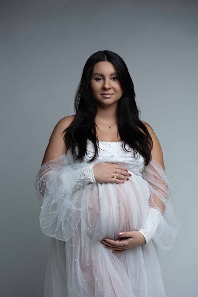 in studio posed pregnant mom