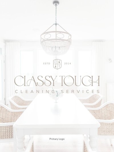 Classy Touch Cleaning Services logo overlay on a bright, airy dining space. Includes 'ESTD 2014' and monogram crest—conveying timeless sophistication for upscale home and commercial cleaning.