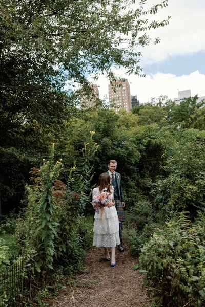 NYC central park elopement greenery couple walking