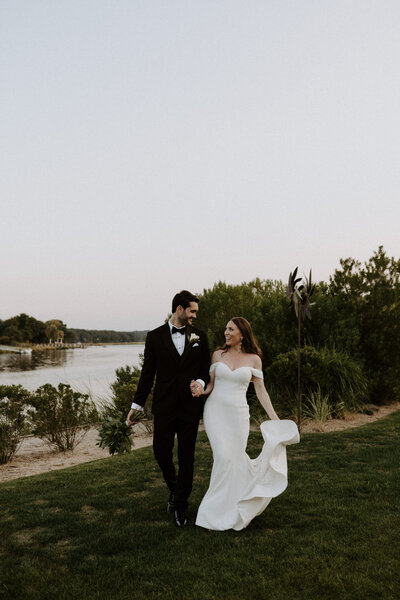 couple walking on grass